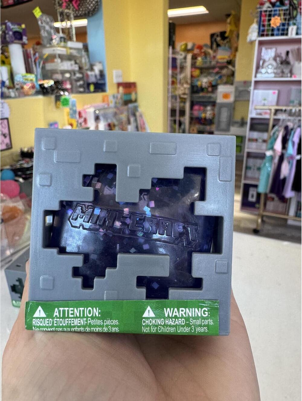 Minecraft jelly squish toy with golden pickaxe